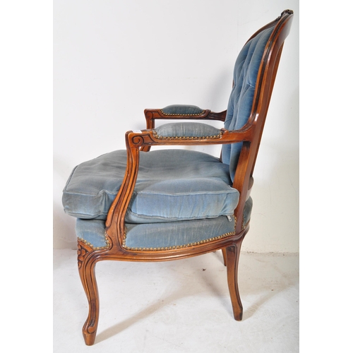 1646 - A pair of 20th century French Louis XV fauteuil armchairs / lounge chairs having carved show wood fr... 