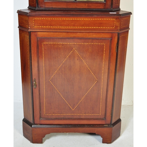 1654 - A 19th century George III mahogany and line inlaid corner cabinet. Raised on bracket feet with inlai... 