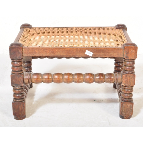 1658 - 1920's mahogany and cane worked foot stool in the William & Mary revival manner. Block and turned le... 