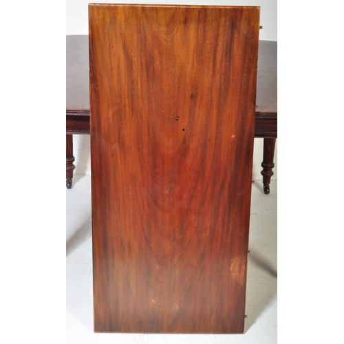 1659 - A 19th century, circa 1850 mahogany dining table. Raised on tapering legs with reeded bulbous column... 