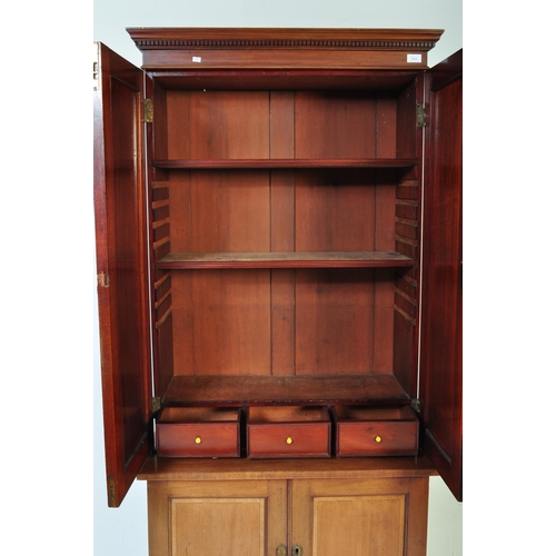 1664 - A 19th century Victorian mahogany estate library bookcase cupboard. Raised on a plinth base with twi... 