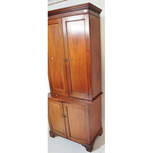 1664 - A 19th century Victorian mahogany estate library bookcase cupboard. Raised on a plinth base with twi... 