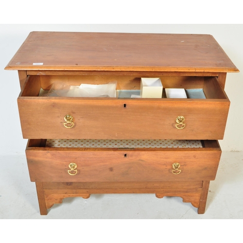 1669 - 1920's Arts & Crafts influenced walnut cottage chest of drawers. Raised on squared legs with a bank ... 