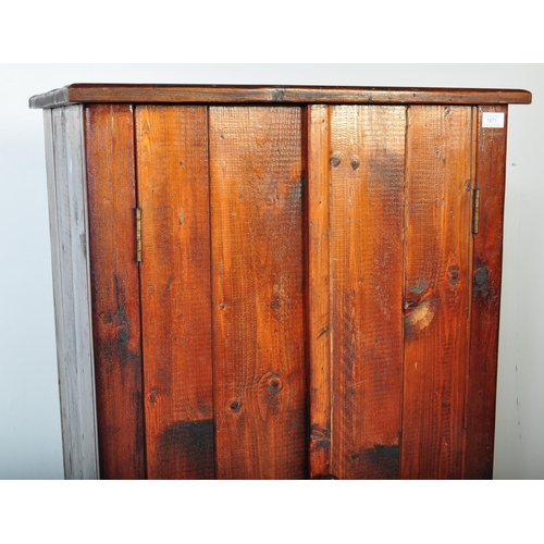 1671 - 20th century Rustic planked and stained pine cupboard larder. Upright sentry box style with twin doo... 