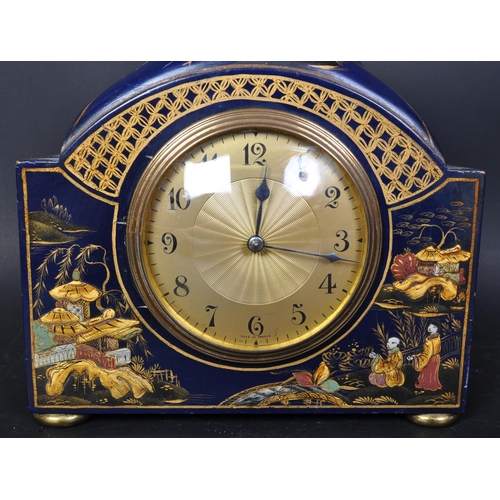 1675 - A early 20th Century Chinoiserie decorated mantel clock. With brass gilt chapter ring ebonised numbe... 