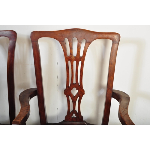 1677 - A set of six Victorian 19th century mahogany kidney back dining chairs having a pierced splat over a... 