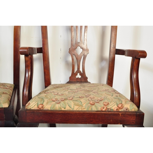 1677 - A set of six Victorian 19th century mahogany kidney back dining chairs having a pierced splat over a... 