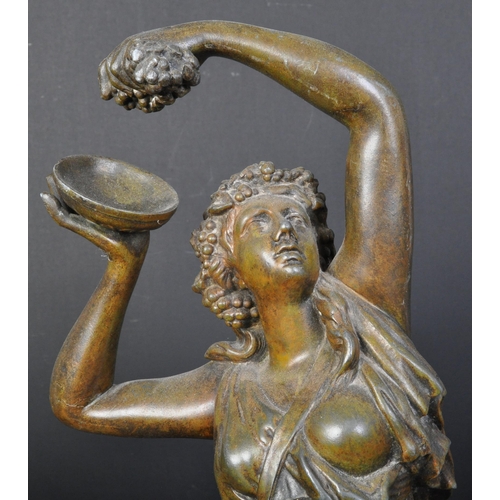 1680 - After P. Clodion, an Art Nouveau bronze figure of a classically draped maiden with a bunch of grapes... 