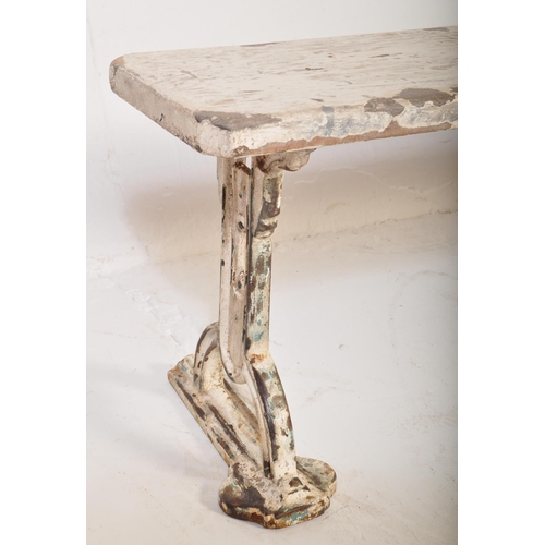 1686 - A Victorian 19th century cast iron & wood painted bench. The bench having painted white cast iron pi... 