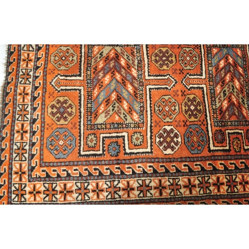 1817 - A vintage mid 20th century Persian Islamic Goltoch wool floor carpet rug with central geometric meda... 