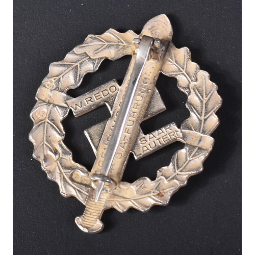 103 - A WWII Second World War Third Reich Nazi German SA Sports Badge. A silver grade example depicting a ... 