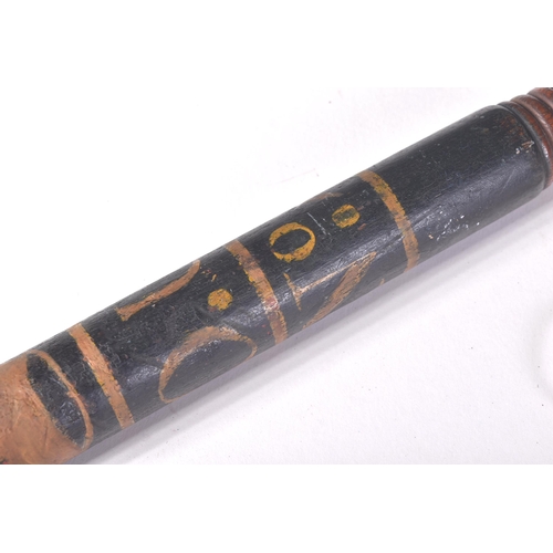 111 - A 19th century Victorian tipstaff / truncheon with ebonised wooden shaft and a turned ribbed handle.... 