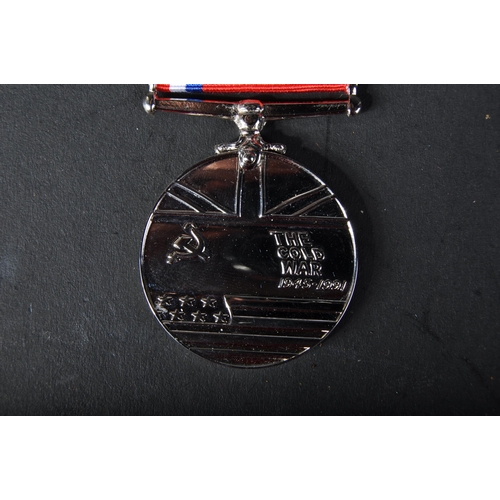 143 - A Cold War Medal issued to one 4028034 Corporal RJ Grant of the Royal Air Force RAF. With original r... 