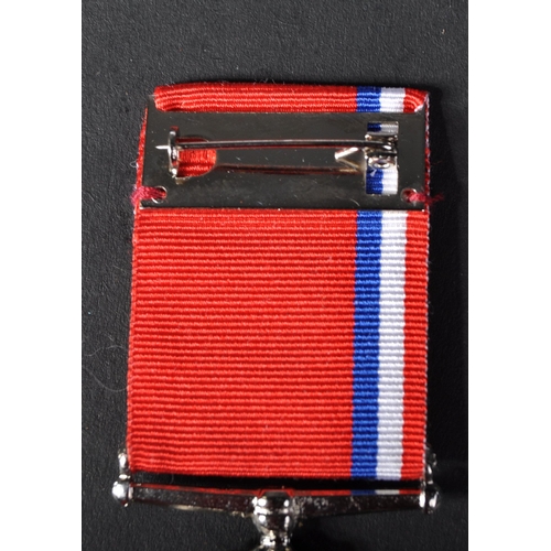 143 - A Cold War Medal issued to one 4028034 Corporal RJ Grant of the Royal Air Force RAF. With original r... 