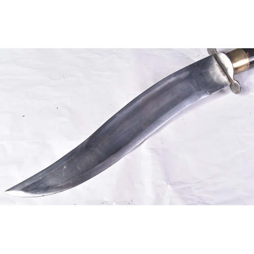 152 - A vintage Indian variation of a Nepalese / Gurkhas Kukri knife. The knife having a hooked pommel wit... 