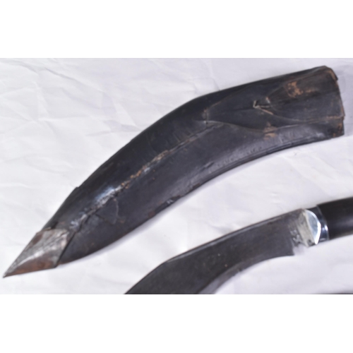 168 - A vintage Nepalese / Gurkha Regiment Kukri knife dagger. The knife having a pommel with diamond shap... 