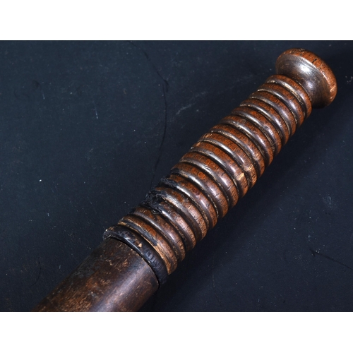 176 - A 19th Century Victorian Police truncheon / tipstaff with concealed blade. Ribbed wooden grip unscre... 