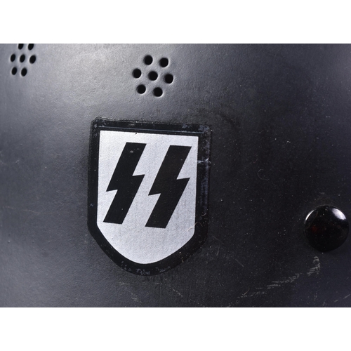 178 - A replica WWII Second World War Third Reich Nazi German style Stahlhelm helmet. The helmet Nazi part... 