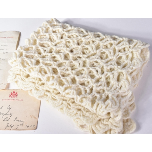 180 - Royal interest - a personally knitted shawl crocheted by Her Majesty Queen Mary in 1927. The shawl w... 