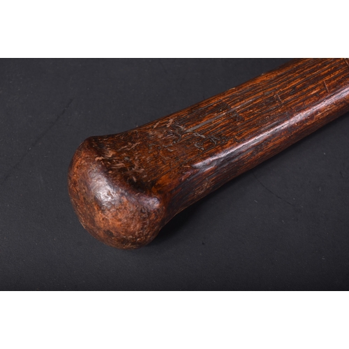 186 - A 19th Century Irish Shillelagh club / wooden truncheon carved into a weighted knob to the top and l... 