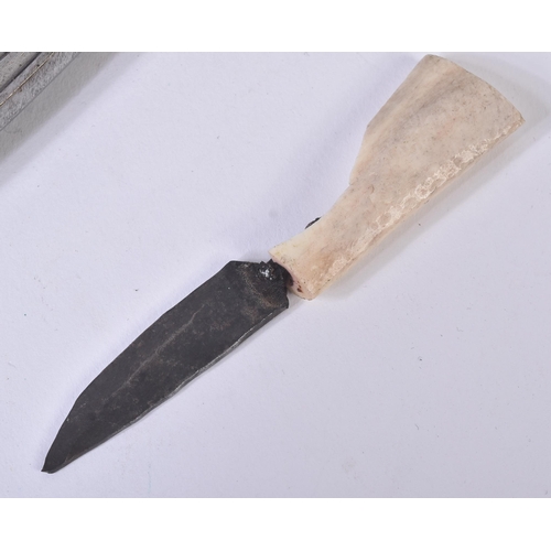 197 - A vintage Nepalese / Gurkha Regiment bone handled Kukri knife dagger. The knife with carved bone han... 