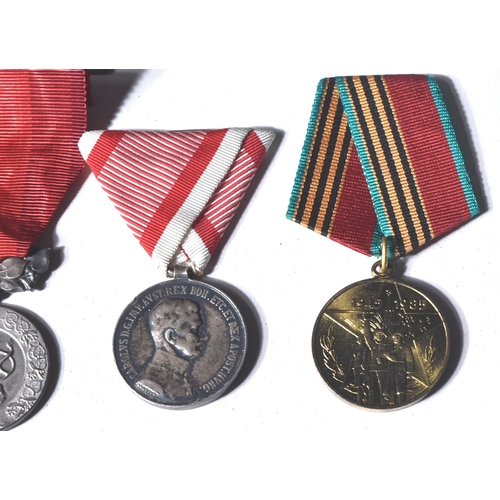 214 - A collection of assorted European First and Second World War (and other) military campaign medals co... 