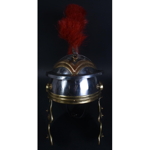 216 - A 20th Century Roman Centurion / Gladiator reenactment Galea helmet. The helmet of steel and brass c... 