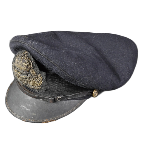 22 - A WWI First World War British Royal Navy Air Service Pilots cap. Dark blue wool construction with a ... 