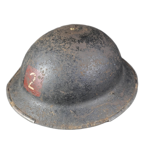 28 - A WWII Second World War British National Fire Service brodie helmet. The helmet of usual form with h... 