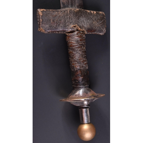 31 - A North African Taureg People / Tribe Takbouba sword. Disk shaped pommel with ball finial and leathe... 