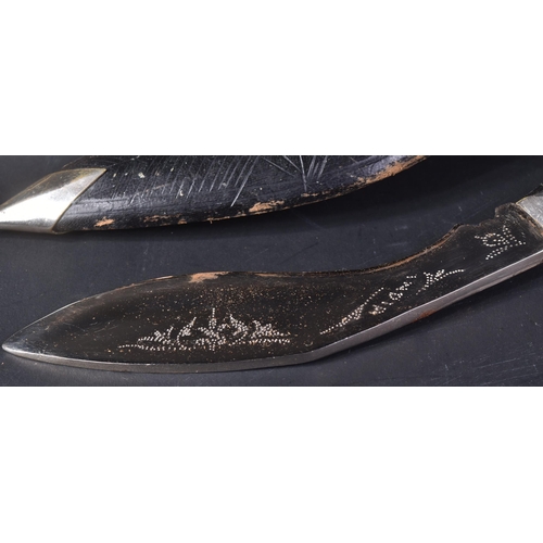 337 - Two vintage Indian made Nepalese / Gurkha style Kukri knives / daggers. Both having lions head pomme... 