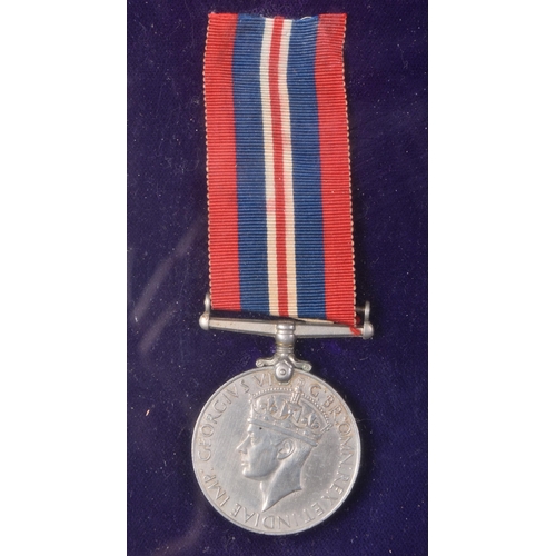 339 - A WWII Second World War British medal trio awarded to one R. Kelly the Royal Navy comprising; The Wa... 