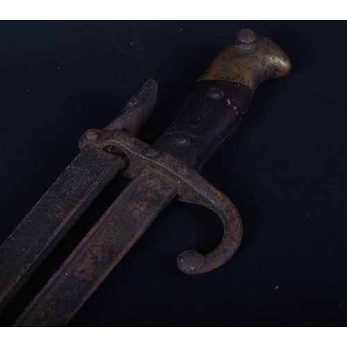 351 - A 19th Century 1874 pattern Gras rifle bayonet trench art in the form of fireplace tongs. The second... 