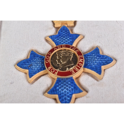 357 - A Queen Elizabeth II CBE Commander Of The Order Of The British Empire medal. The front having a the ... 