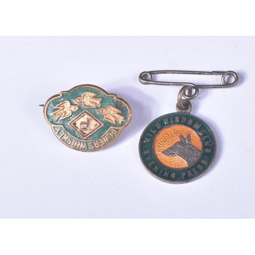 443 - Badges - a collection of x3 c1930s enamel badges, to include; a Powers Whiskey badge in green enamel... 