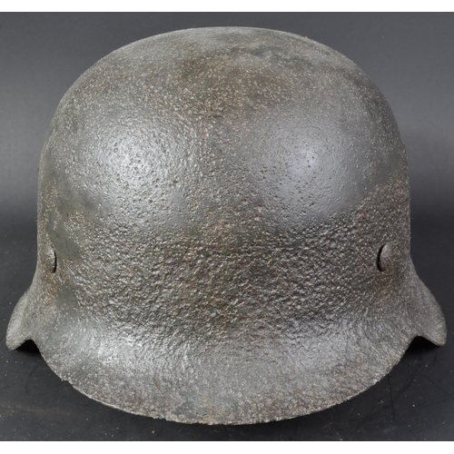 81 - A WWII Second World War Third Reich Nazi German M40 Stahlhelm Infantry helmet. A relic example with ... 