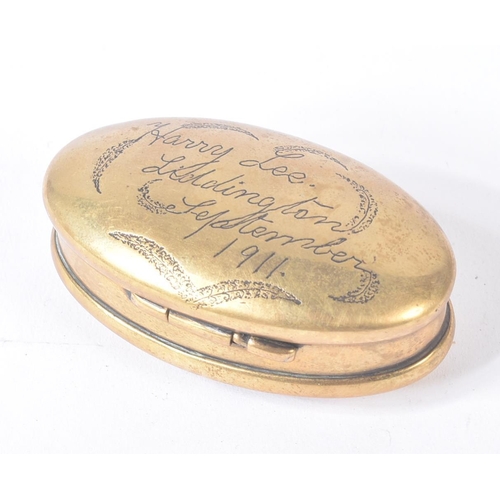 96 - Local interest - an early 20th Century (1911) miners brass tobacco / snuff box punched to the top Ha... 