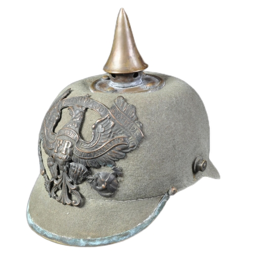 10 - A WWI First World War Imperial German Army / Prussian M15 pickelhaube uniform helmet. A felt constru... 