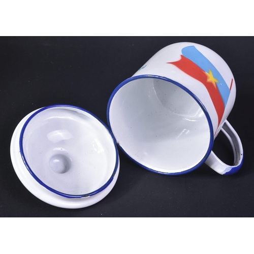 102 - A Vietnam War era rice cup dedicated to the Viet Cong. The white enamel cup with Viet Cong flag stri... 