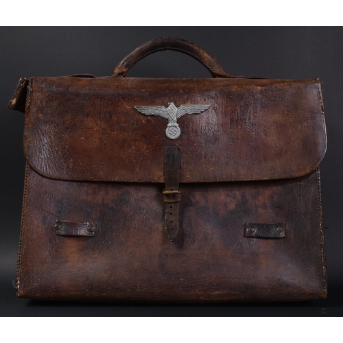 108 - A WWII Second World War Third Reich Nazi German Officers briefcase. Rigid brown leather construction... 