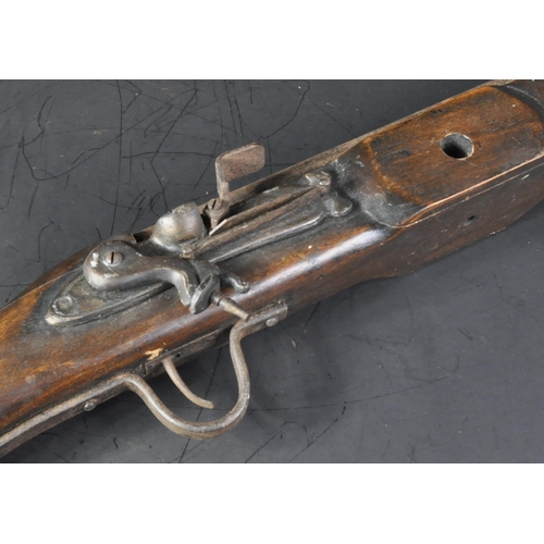 112 - A 20th Century vintage wall hanging Flintlock Blunderbuss style rifle. The rifle having a flared bar... 