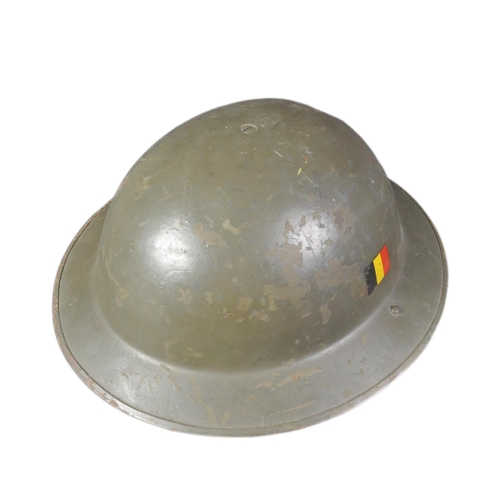 114 - A vintage 1950s (1958) Belgian MKII / Mark 2 helmet. The helmet being a clone of the British Brodie ... 