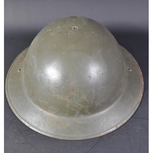 114 - A vintage 1950s (1958) Belgian MKII / Mark 2 helmet. The helmet being a clone of the British Brodie ... 