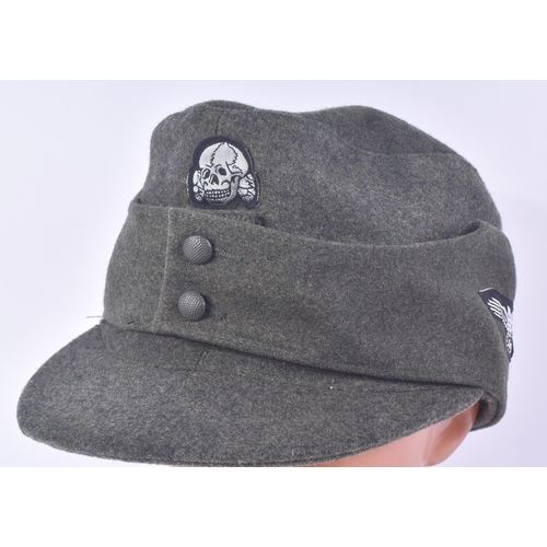 122 - A replica WWII Second World War Third Reich Nazi German Heer / Waffen SS M43 Ski cap. Field grey woo... 