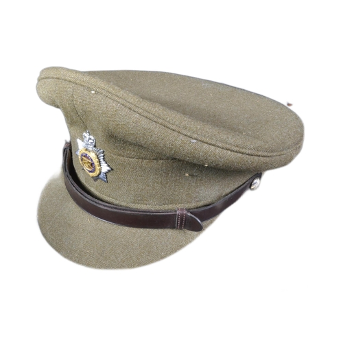 137 - A post war vintage Royal Army Service Corps officers dress uniform peaked cap. Khaki twilled wool wi... 