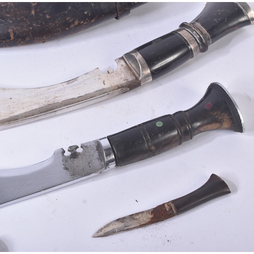 139 - Two vintage Nepalese / Gurkha Regiment Kukri knife dagger. Both examples with white metal capped pom... 