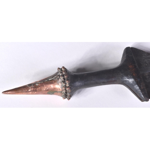 153 - An early 19th Century Central African / Congolese tribal dagger. The dagger having a copper dome sha... 