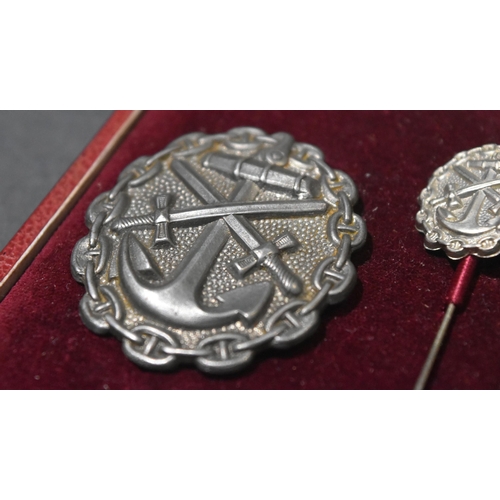 185 - A WWI First World War Imperial German Navy ( Kaiserliche Marine ) wound badge and lapel pin. A silve... 