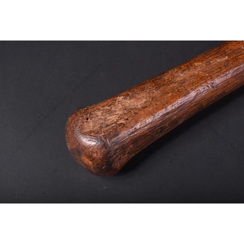 186 - A 19th Century Irish Shillelagh club / wooden truncheon carved into a weighted knob to the top and l... 