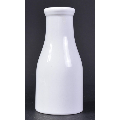 189 - A WWII Second World War Third Reich Nazi German Waffen SS Milk Bottle. White glossed ceramic of typi... 